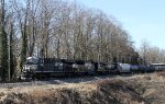 NS 8047 leads ethanol train 64D eastbound